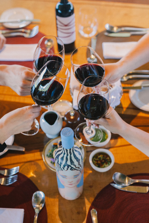 Constanza Miranda Wine La Piu Belle VIK Glass Friends Hands  Woman Man Food Plate Fork Knife Spoon Napkin red toast tasting table setting cutlery