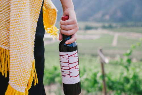 Constanza Miranda Product Bottle artistic shots valley woman poncho Milla Cala crops Landscape - Nature ruana