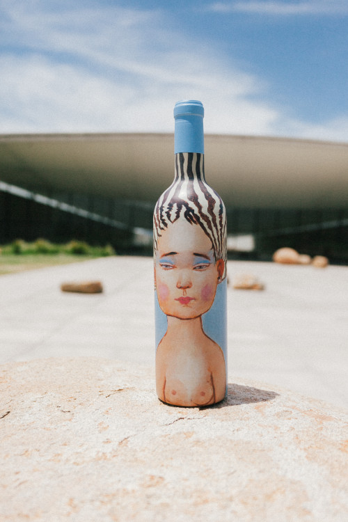 Constanza Miranda Bottle Artistic Shots La Piu Belle wine cellar sky blue