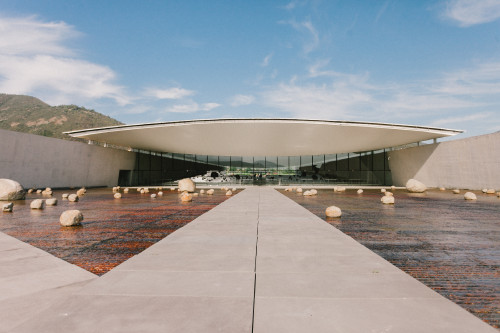Exterior Constanza Miranda  water rocks footpath path clouds sky Sloping Plaza architecture