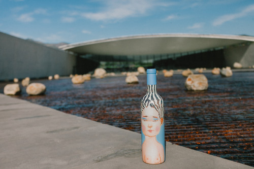 Constanza Miranda Bottle Artistic Shots La Piu Belle sloping plaza rocks water wine cellar