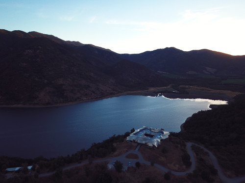 Joaquín Rivas VIK Hotel exterior top view roof architecture mountains landscape nature reservoir lake