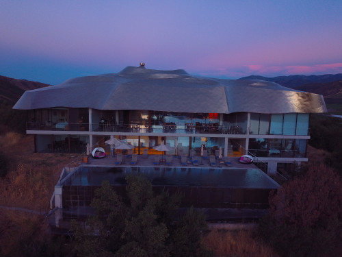 Joaquín Rivas VIK Hotel exterior architecture swimming pool sunshade roof view room bedroom table chair lounging