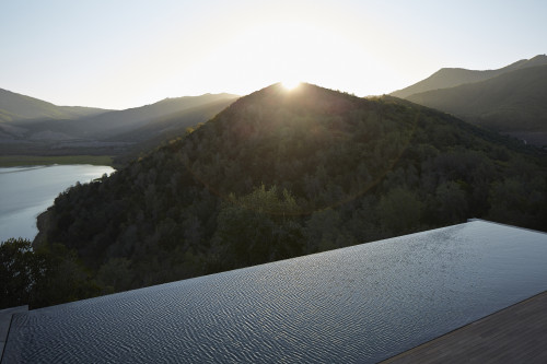 swimming pool landscape nature mountains valley sunset VIK Chile indulgence