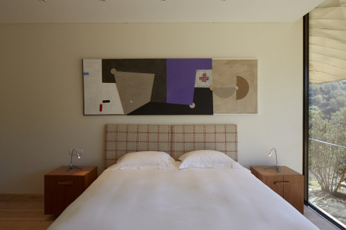 Abelli Guest Suite Hotel VIK   interior bedroom  window view painting lamps night table double bed headboard