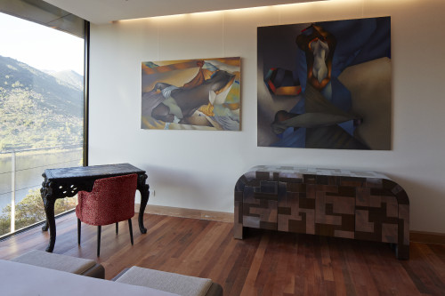 Retro Suite VIK Hotel interior rooms paintings window view reservoir armchair table lake desk furniture