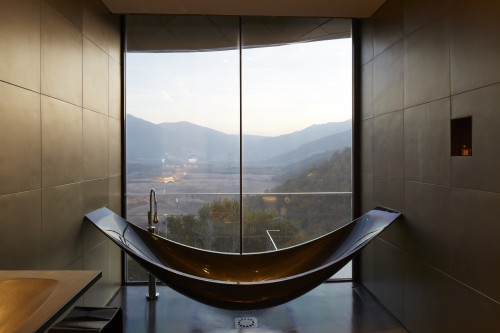 VIK Vessel Hotel Interior Rooms bathroom window view mountains landscape tub Chile