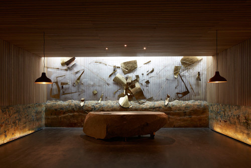 interior tasting rooms  wood sculpture stone table lamps