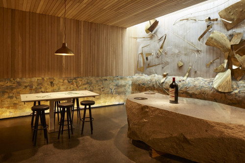 interior tasting rooms wood VIK sculpture bottle artistic shots stone tables lamps map harvest