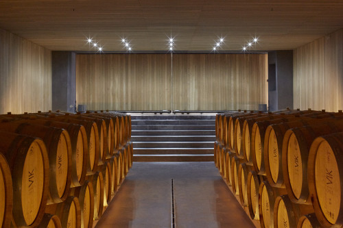 interior tasting rooms barrels wood production facilities  VIK lights sliding door architecture