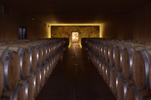 interior tasting rooms barrels wood production facilities product bottle VIK stone table sculpture