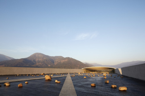 Exterior Cristóbal Palma Sloping Plaza mountains rocks landscape blue sky footpath water path architecture