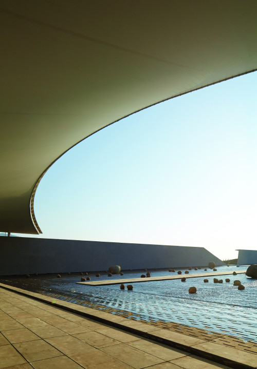 Exterior Cristóbal Palma Sloping Plaza  rocks  sky  footpath water path roof detail architecture