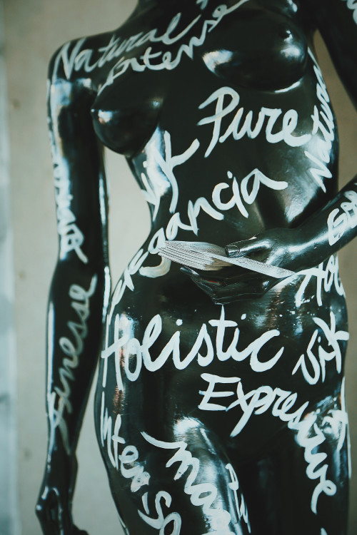 words  VIK Hotel interior woman body paint sculpture 
mannequin black white holistic living room