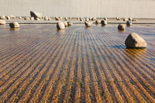 Exterior sloping plaza rocks  footpath water architecture