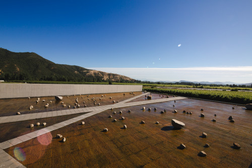 Exterior sloping plaza rocks  footpath  mountains valley blue sky crops vine landscape nature architecture