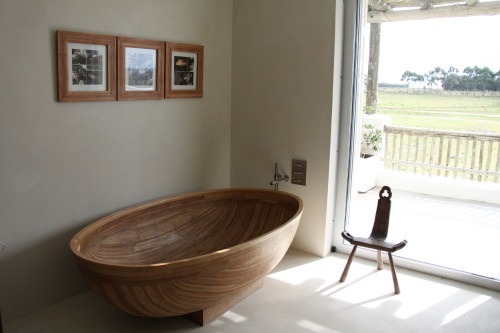 Estancia VIK Jose Ignacio Uruguay Master Suite Daglio window view chair bathroom bathtub landscape trees grass
