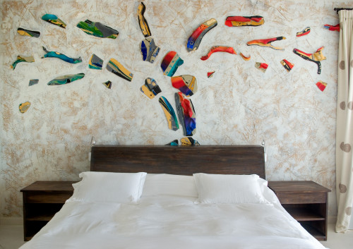 Estancia VIK Jose Ignacio Uruguay Kike Badaro Suite double bed room night table curtains cushions pillows sculpture