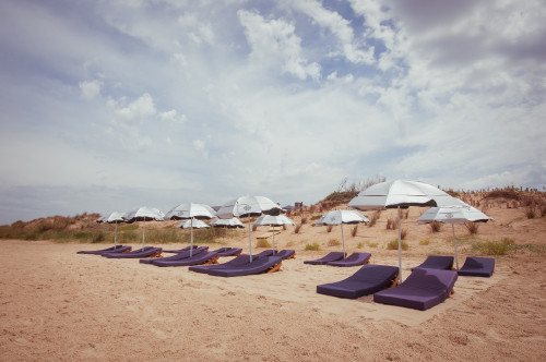 La Susana Restaurant José Ignacio Uruguay  beach sand sunshade Lounging chairs bush exterior