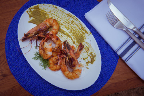 La Susana Restaurant José Ignacio Uruguay 
prawns fork knife plate napkin Robert Welch blue