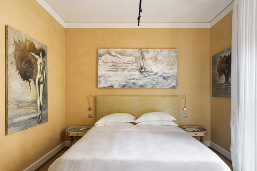 Galleria VIK Milano Italy Suites Deluxe Gallery Rooms Room 324  Monnini furniture 
bedroom  double bed  paintings curtains night table pillows headboard lamps