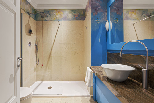 Galleria VIK Milano Italy Suites Deluxe Gallery Rooms 324 Monnini bathroom sink shower blue towels mirror lamp