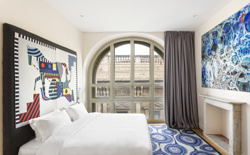Galleria VIK Milano Italy Room 524 VIK Presidential Suite Mori 
paintings  bedroom door window view  double bed  pillows night table headboard Hermes Vittorio Emanuele II  painting carpet fireplace curtain