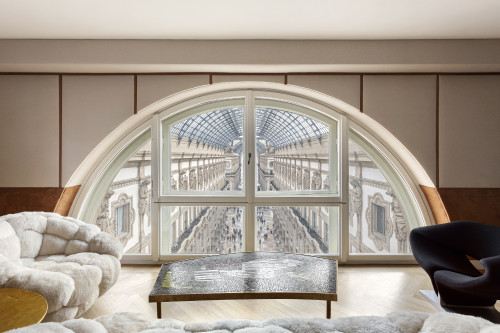 Galleria VIK Milano Italy Room 524 VIK Presidential Suite Mori 
window view Vittorio Emanuele II sofa armchair table living people roof ceiling