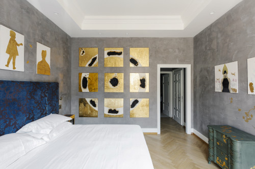 Galleria VIK Milano Italy Suites Deluxe Rooms 401 Trailina bedroom double bed headboard pillows door paintings furniture Chest of drawers night table lamp
