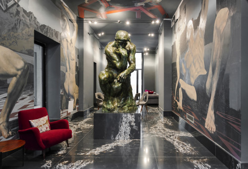 Galleria VIK Milano Italy Reception painting Alex Folla sculpture armchair table sofa chair cushion