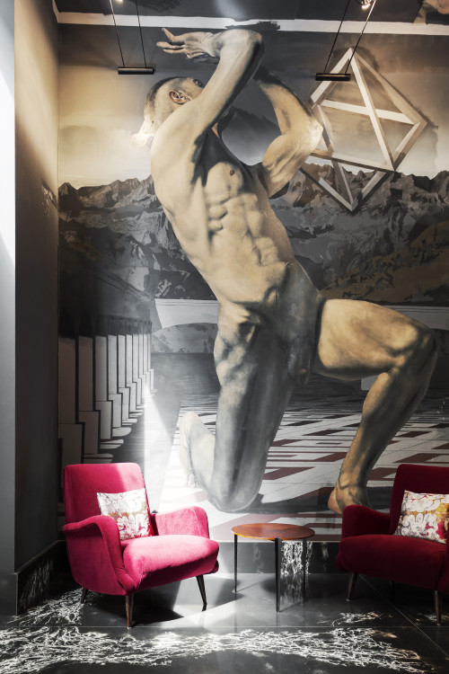 Galleria VIK Milano Italy Reception painting Alex Folla armchair table cushion