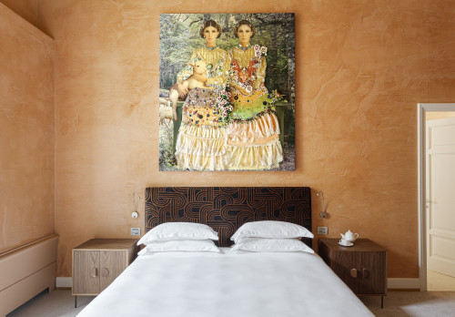 Galleria VIK Milano Italy Suites Palace Room 207 Nina Surel bedroom double bed headboard pillows night table lamps  paintings furniture door teapot cup