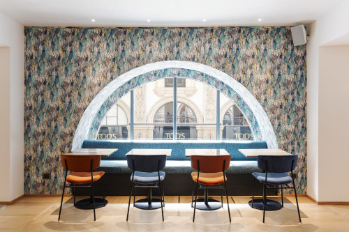 Galleria VIK Milano Italy Vikissimo Restaurant chairs tables window view Tods