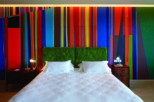 Bahía VIK José Ignacio Uruguay Lopez Laje Suite  Main Building bedroom double bed green headboard pillows night table lamps colors walls lights