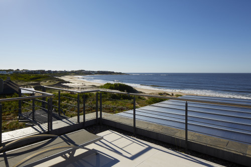 Balcony  Main Building Bahía VIK José Ignacio Uruguay landscape nature village view sea Lounging chairs bush green blue sky