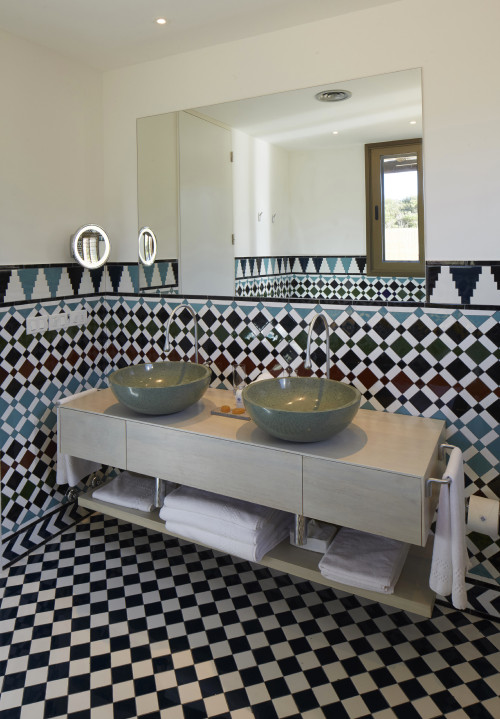 Bahía VIK José Ignacio Uruguay Quincha Turko Bungalows bathroom sink mirror towels window