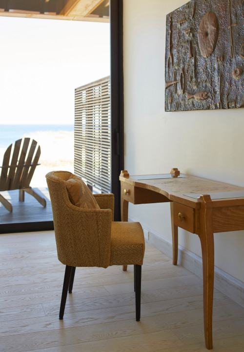 Bahía VIK José Ignacio Gurvich Suite Corten Bungalow interior sea chair armchair desk window cushion sculpture painting