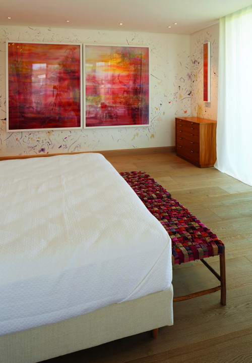 Bahía VIK José Ignacio Rita Suite Main Building bedroom double bed headboard pillows night table lamps curtains paintings bench Chest of drawers furniture interior