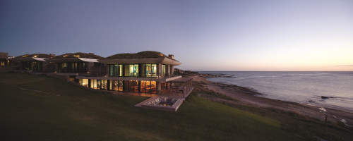 Playa VIK José Ignacio Uruguay sunset beach sea evening Casa Mar Ebano  Raíces side view grass terrace exterior gym bbq firepit barbeque
