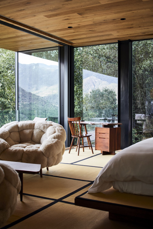 Puro VIK Chile Casas Hiroshige interior  bedroom double bed  furniture desk chair window view armchair table mountains trees