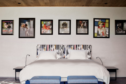Puro VIK Chile Casas Holograph bedroom double bed headboard pillows night table lamps bench  paintings interior
