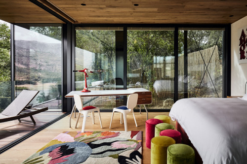 Puro VIK Chile Casas Letras bedroom double bed lamp carpet chair desk window view mountains valley Lounging chairs nature trees terrace interior