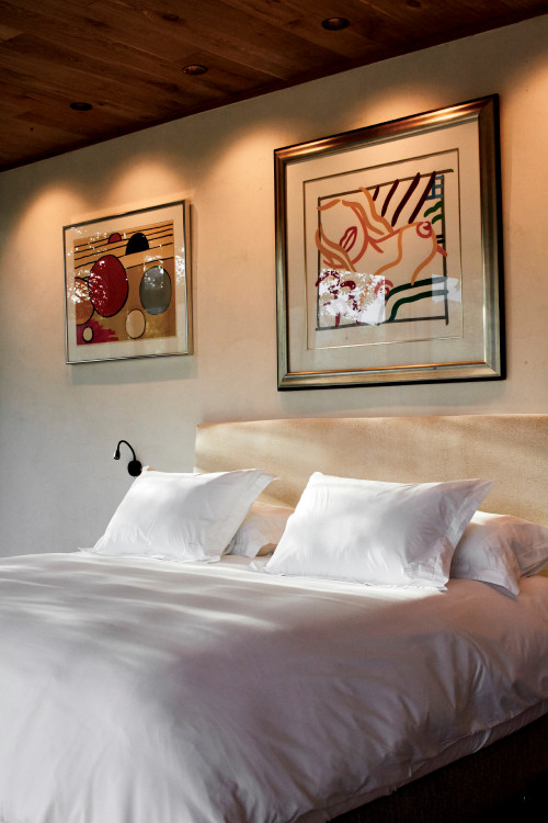 Puro VIK Chile Casas Boho Pop bedroom double bed headboard pillows paintings lamp lights interior