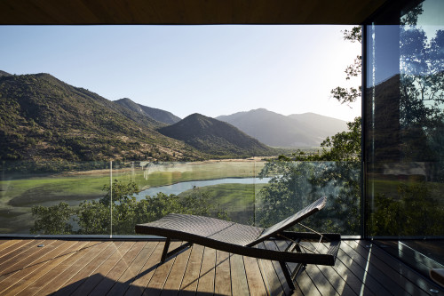 Puro VIK Chile Casas Lounging chairs terrace mountains landscape nature valley window view  green lake reservoir trees