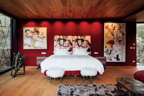 Puro VIK Chile Shape of Woman bedroom double bed headboard pillows night table lamps stool paintings sculpture carpet window red