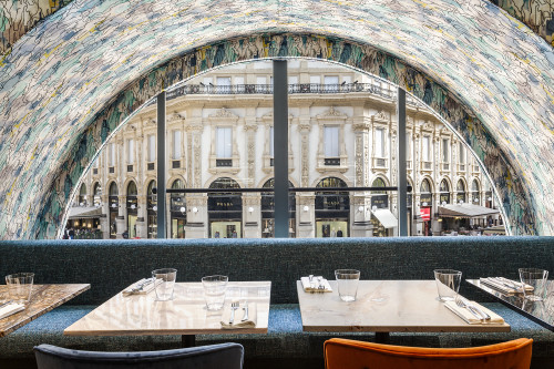 Galleria VIK Milano Italy Vikissimo Restaurant chairs tables window view Tods setting glass fork knife napkin interior