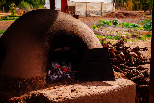 clay oven firewood ember orchard green brown