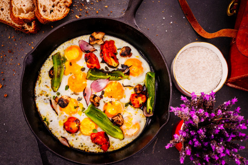 skillet vegetables eggs flower eggplant tomato food onion peppers mushrooms salt bread
lavender