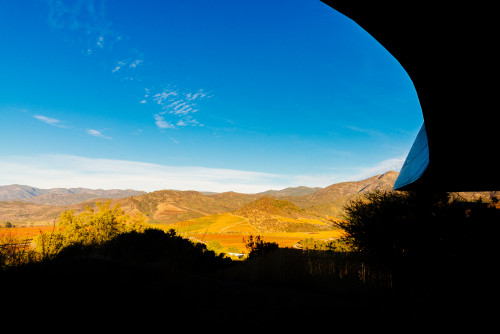 VIK Hotel exterior bush trees blue sky clouds valley view vineyards mountains