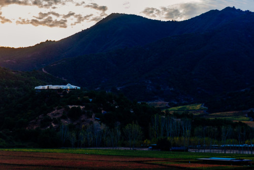 VIK Hotel exterior bush trees sky clouds vineyards red landscape nature mountains sunset